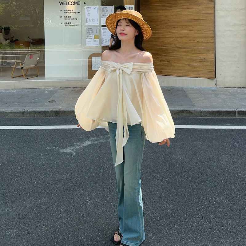 เสื้อเชิ้ตแขนพองสไตล์ฝรั่งเศสส - Asymmetric Top Women บทวิจารณ์และราคา